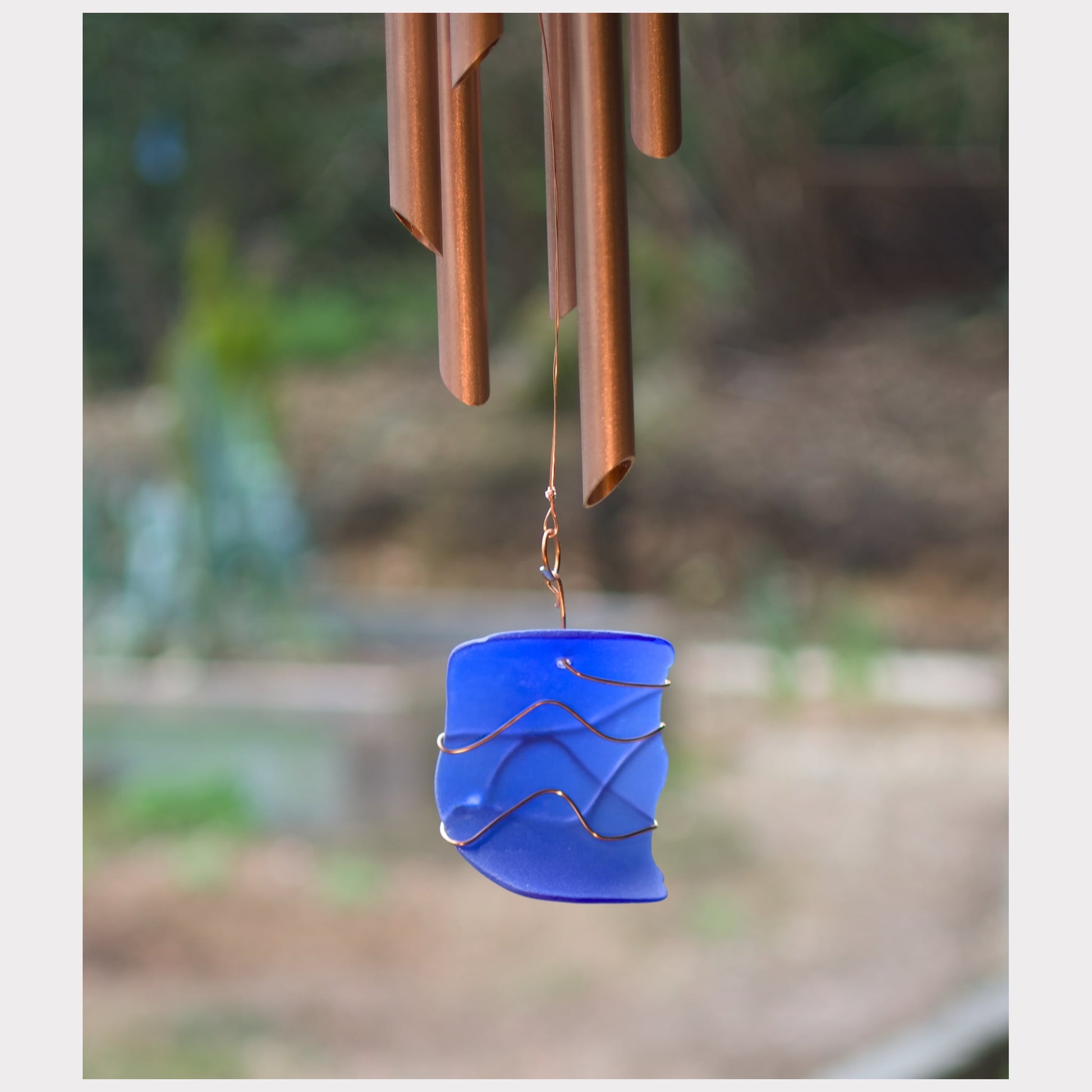 detail, cobalt blue glass windsail for a wind chime