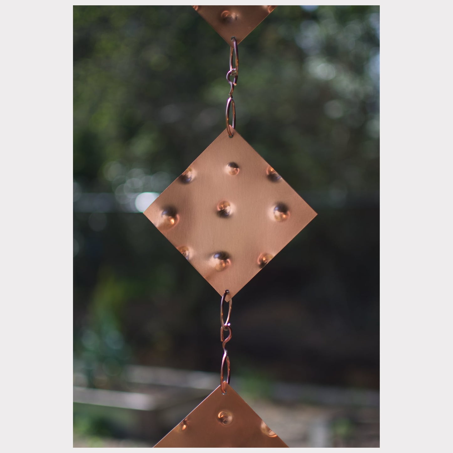 zoom detail, copper wind chime