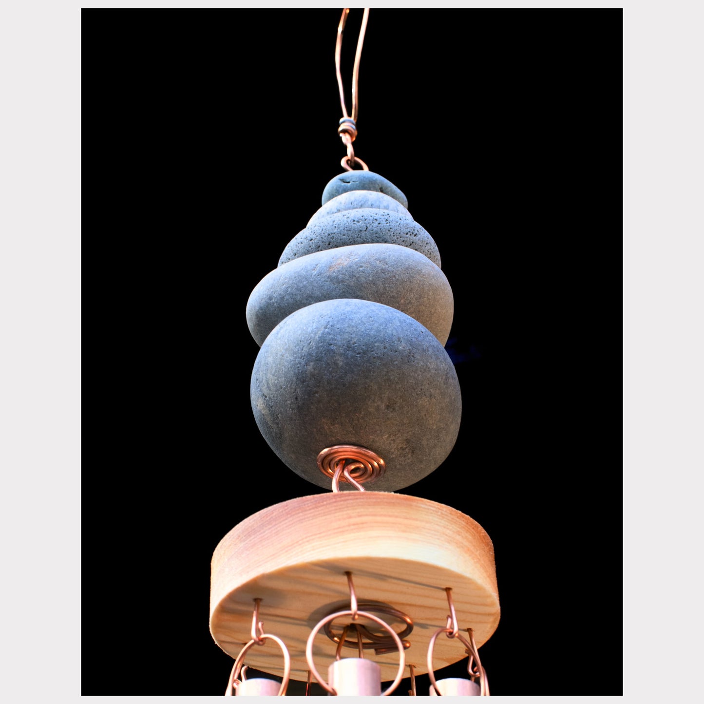 bottom view, zen beach stone wind chime
