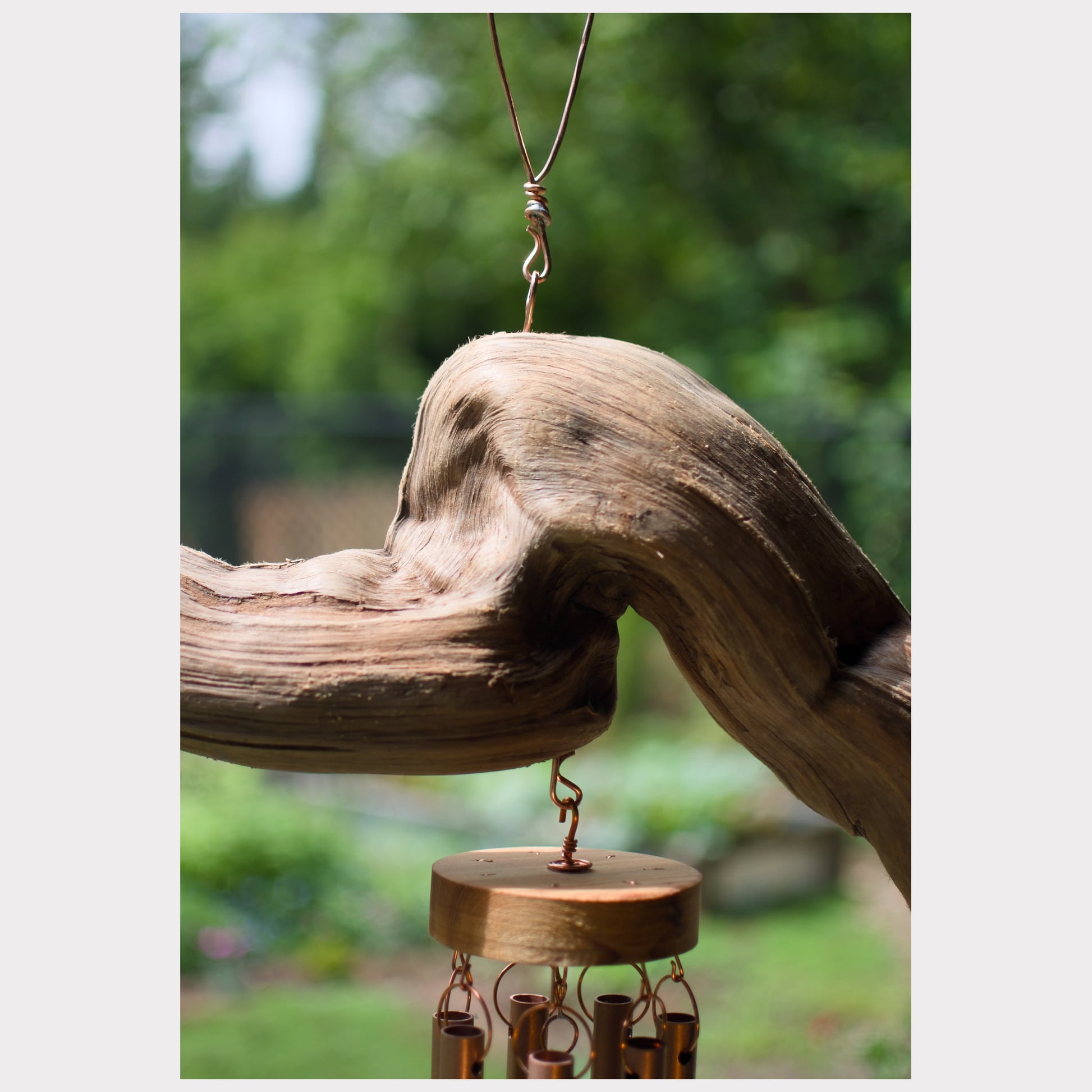 zoom detail, natural driftwood wind chime.