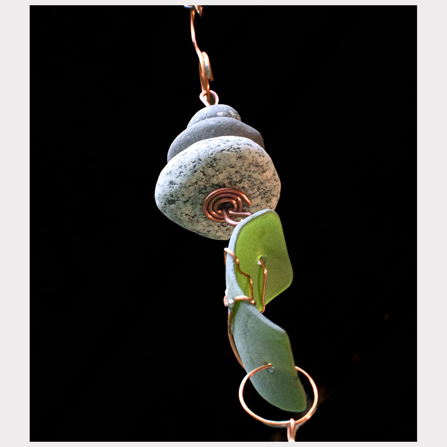 bottom view, zen beach stone wind chime