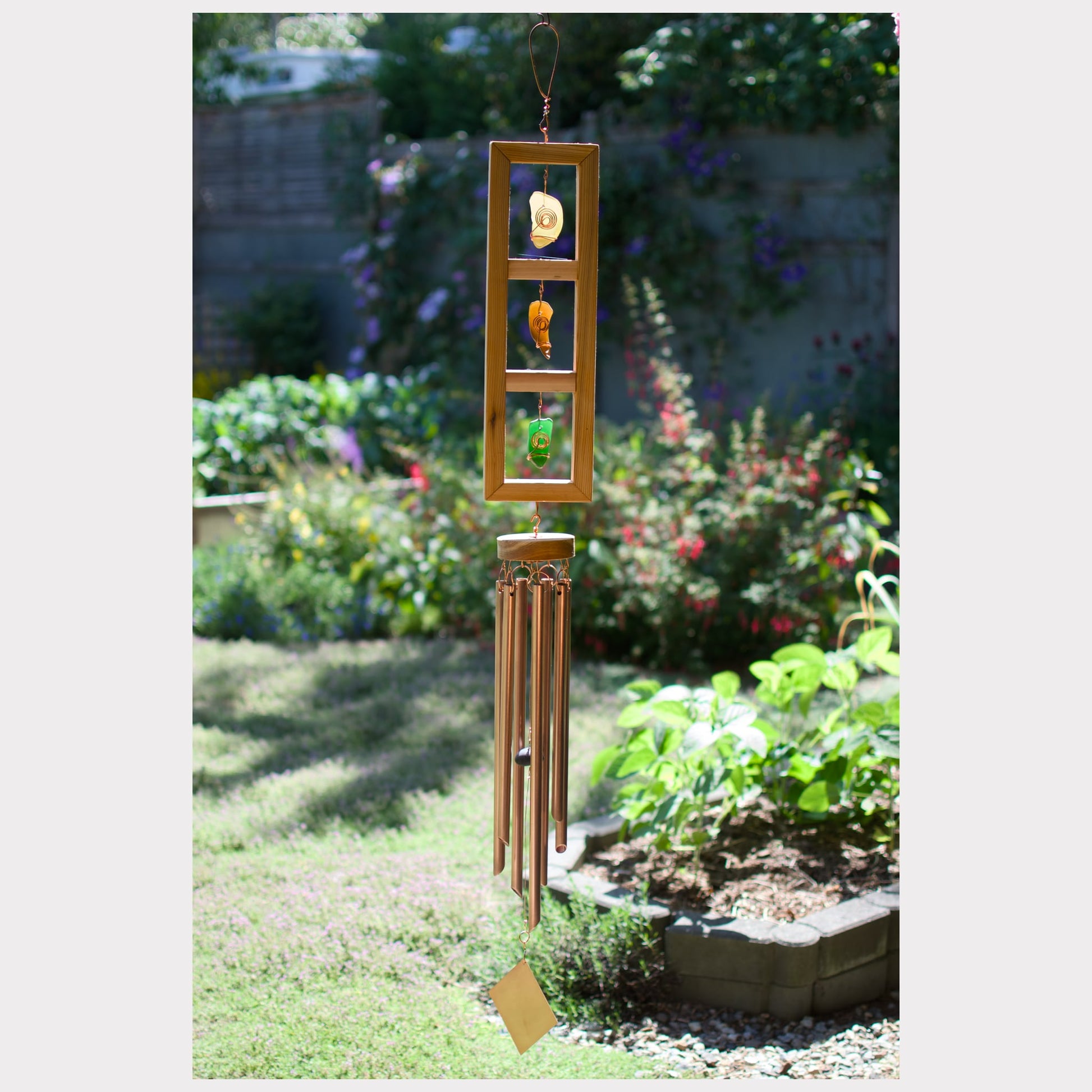 Cedar and sea glass wind chime with seven copper chimes.