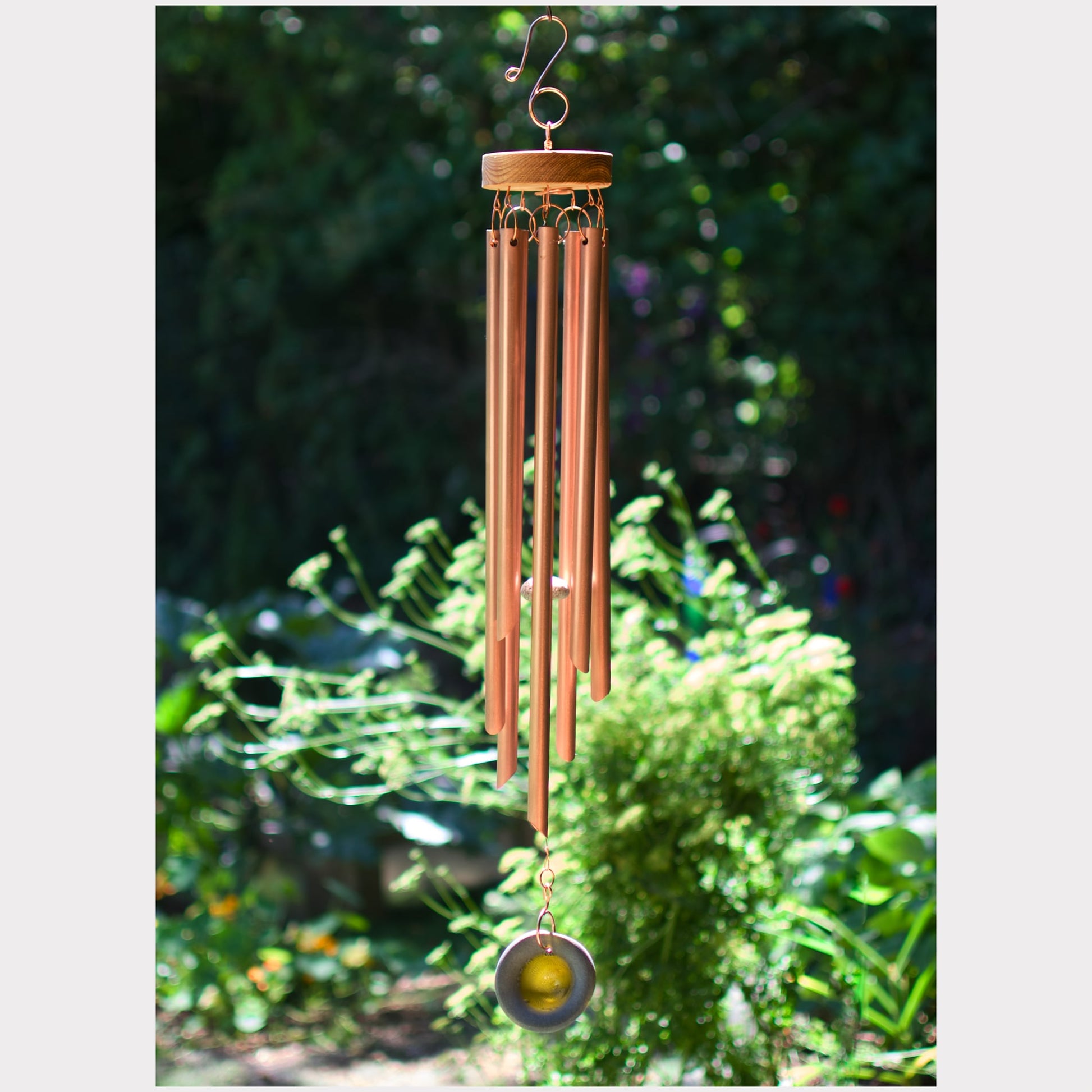 Wind chime featuring 7 copper chimes and an artist-made beach glass windsail, Coast Chimes.