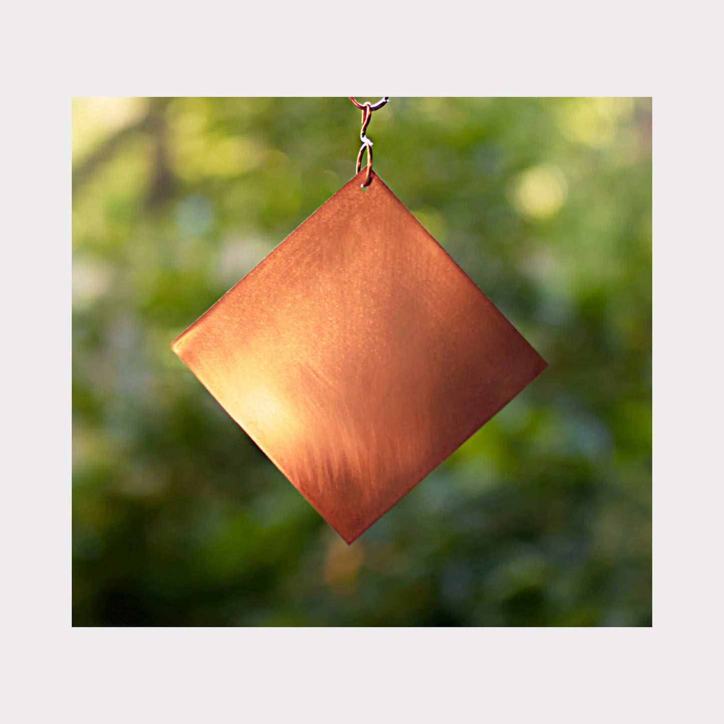 Handmade copper windsail for a wind chime.