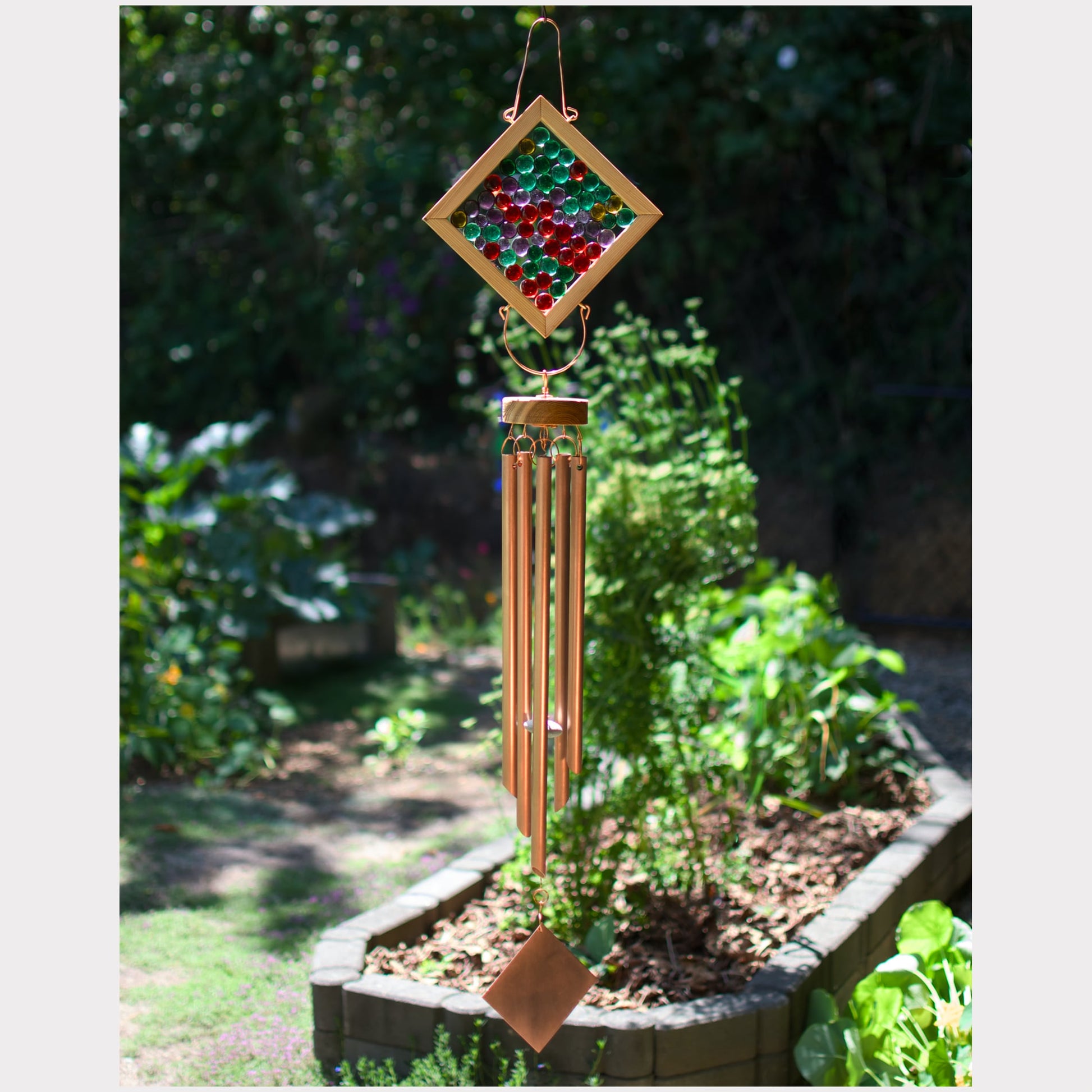 Kaleidoscope wind chime featuring red, green, purple glass and 5 handmade copper chimes.