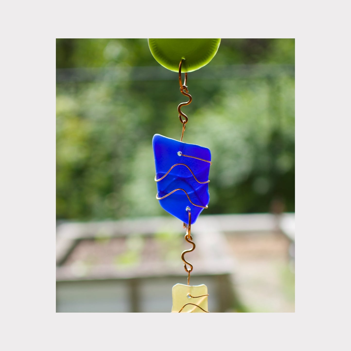 Zoom detail, glass wind chime.
