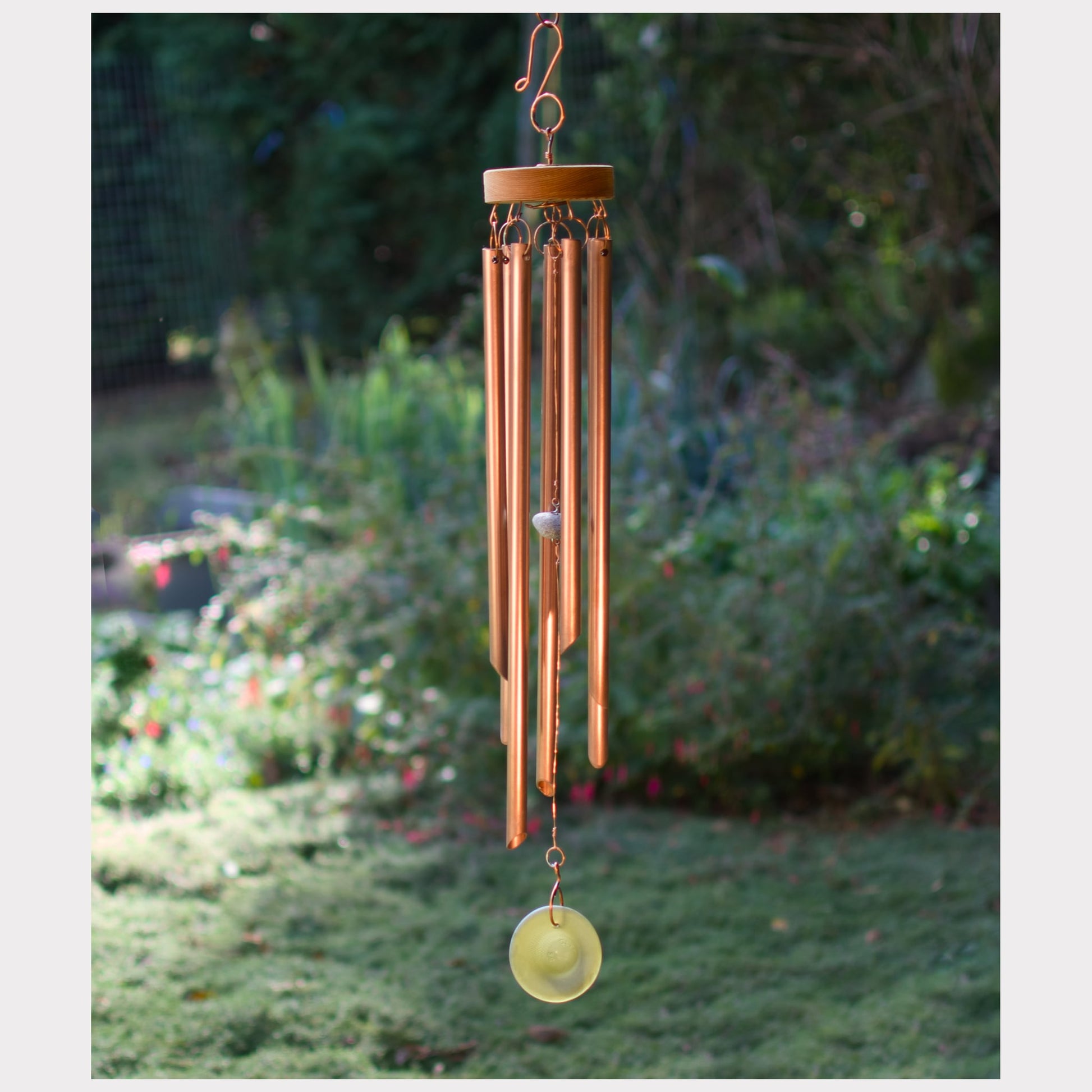 Handcrafted copper wind chime with 7 chimes and a sea glass windsail.