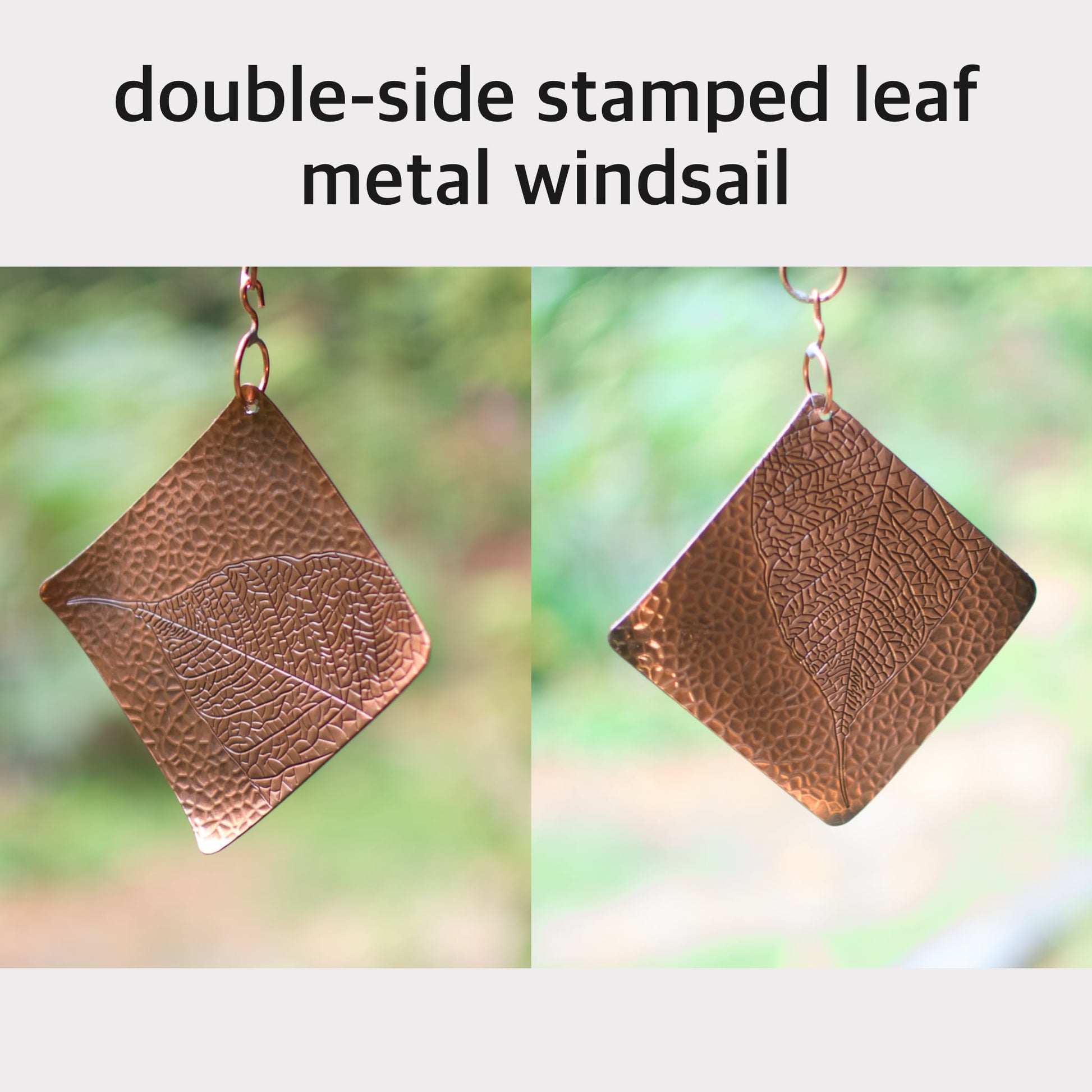 Double-side stamped leaf metal windsail on a blurred green background