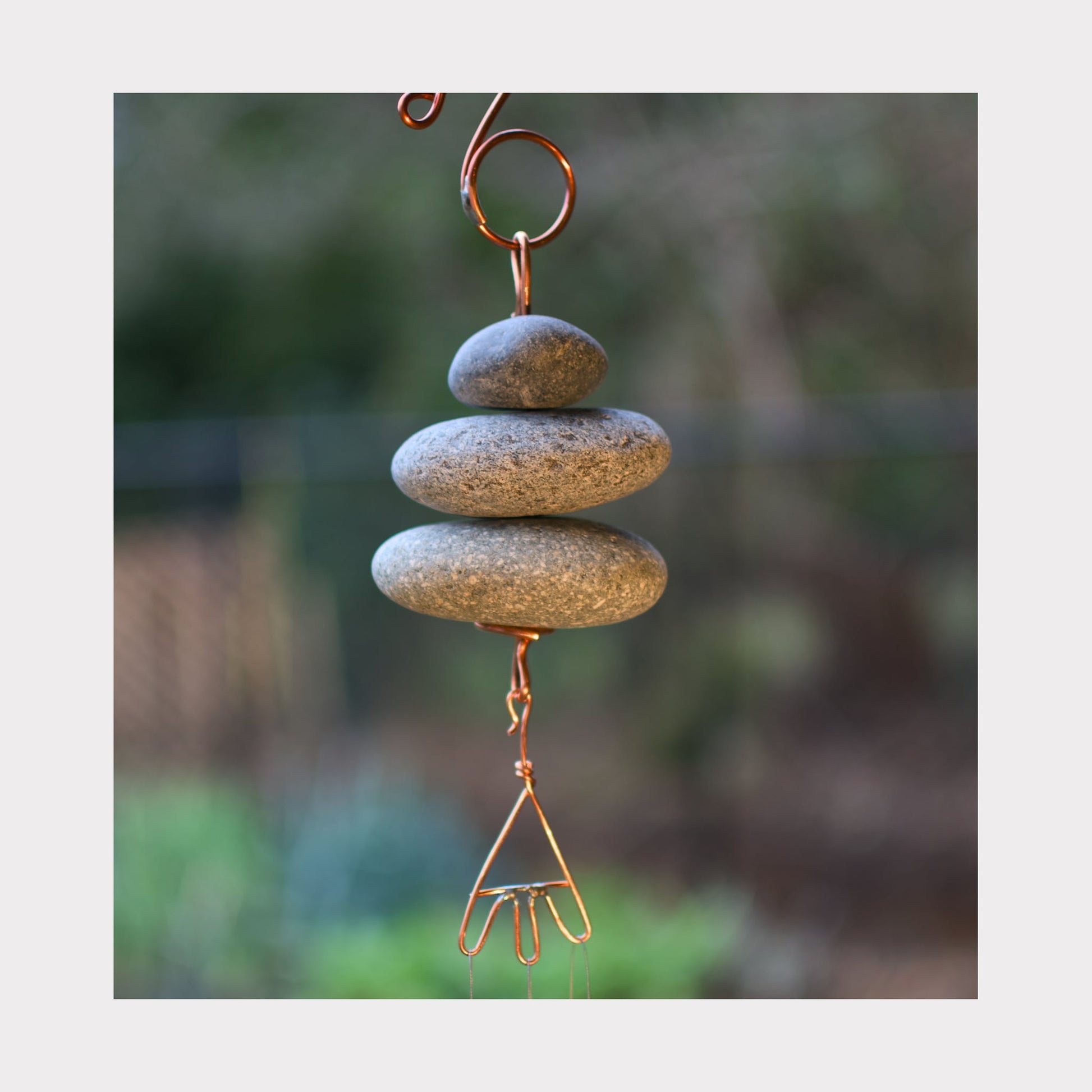 detail, zen beach stone wind chime