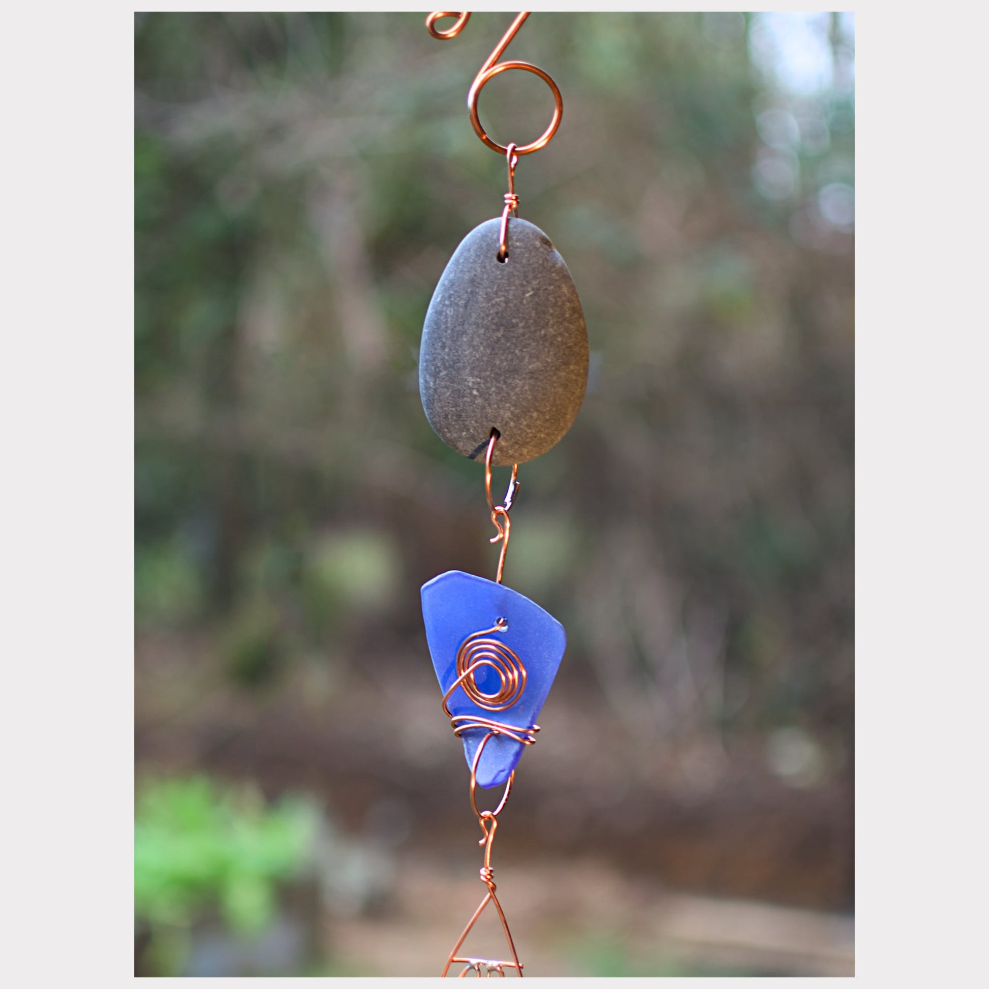 detail, beach stone and sea glass wind chime