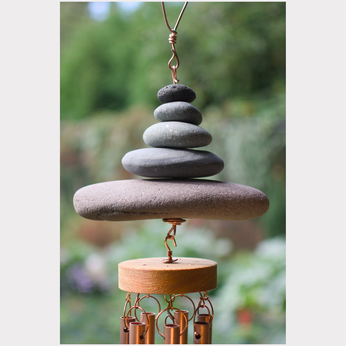 Detail, beach stone wind chime.