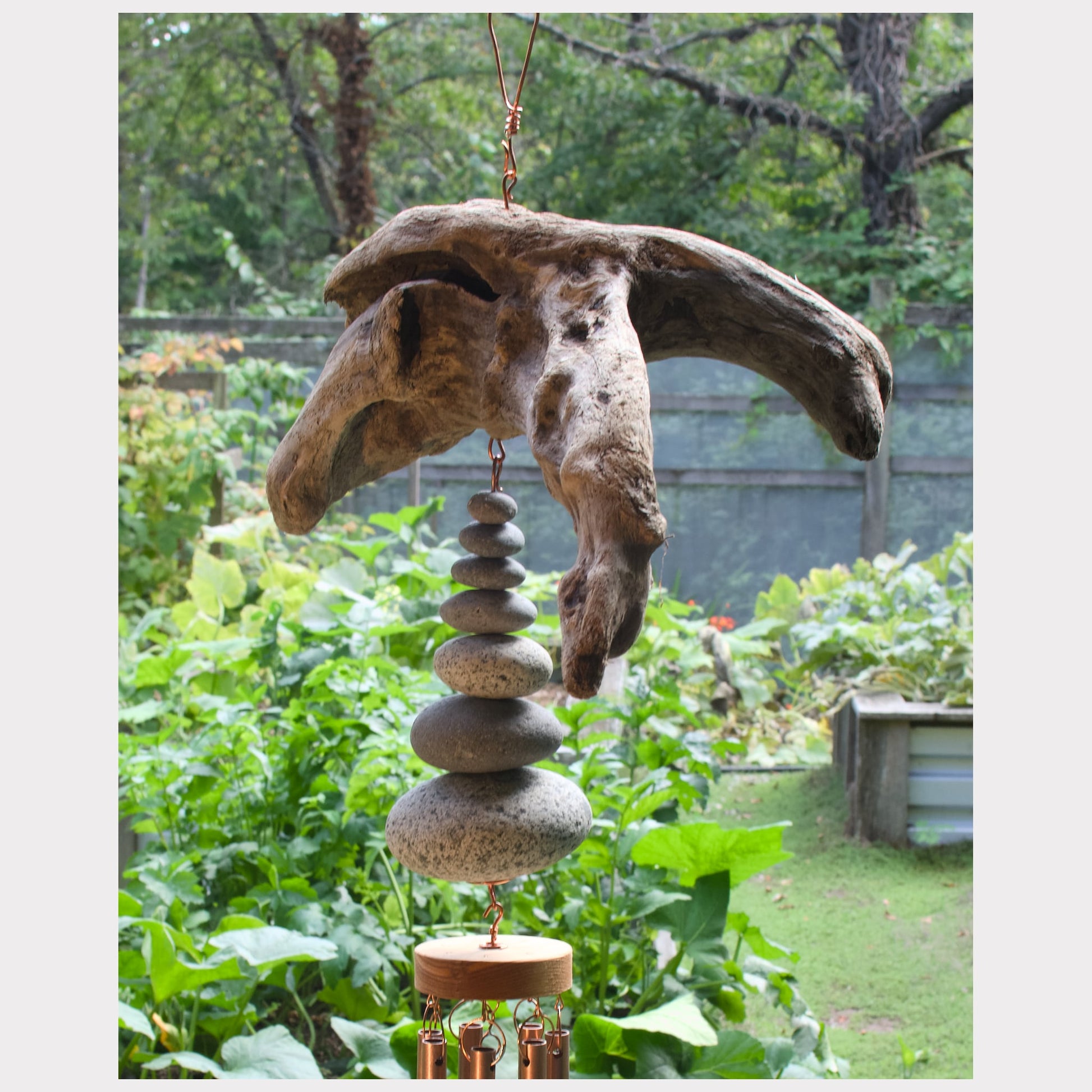 sideview, driftwood beach stone wind chime