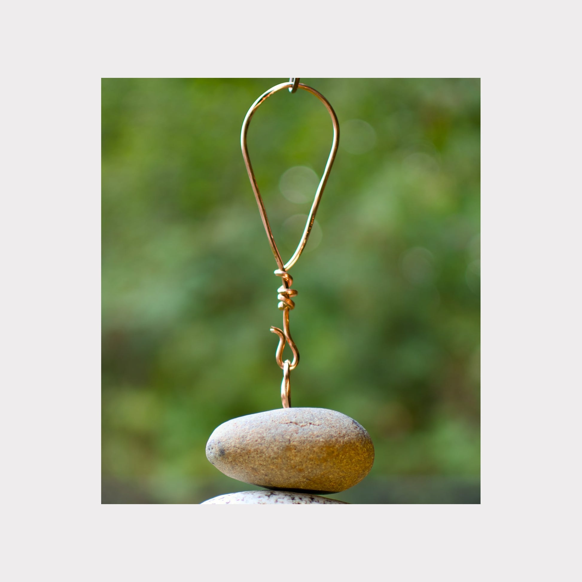 Handmade copper hanging loop for a large, heavy wind chime.