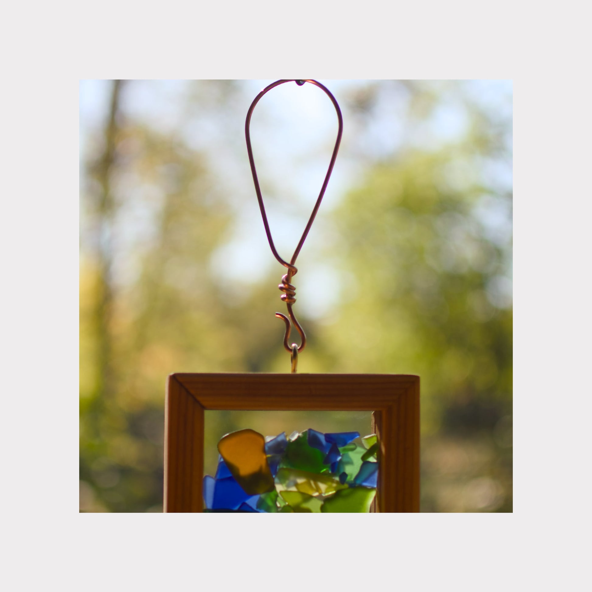 Handmade copper hanging loop for a heavy wind chime, by Coast Chimes.