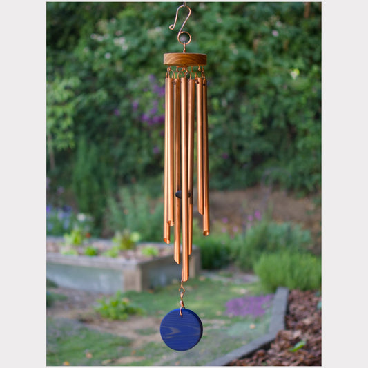 Wind chime featuring genuine copper and an eye-catching cobalt blue oiled cedar windsail.