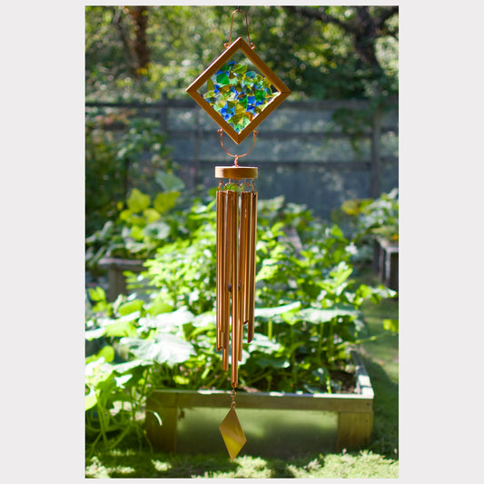 Large sea glass kaleidoscope wind chime with seven copper chimes.