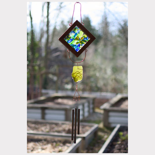 Kaleidoscope small size wind chime featuring artist-made sea glass and three brass chimes.