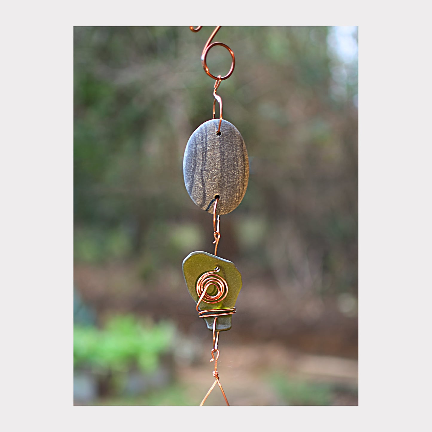 detail, beach stone and sea glass wind chime