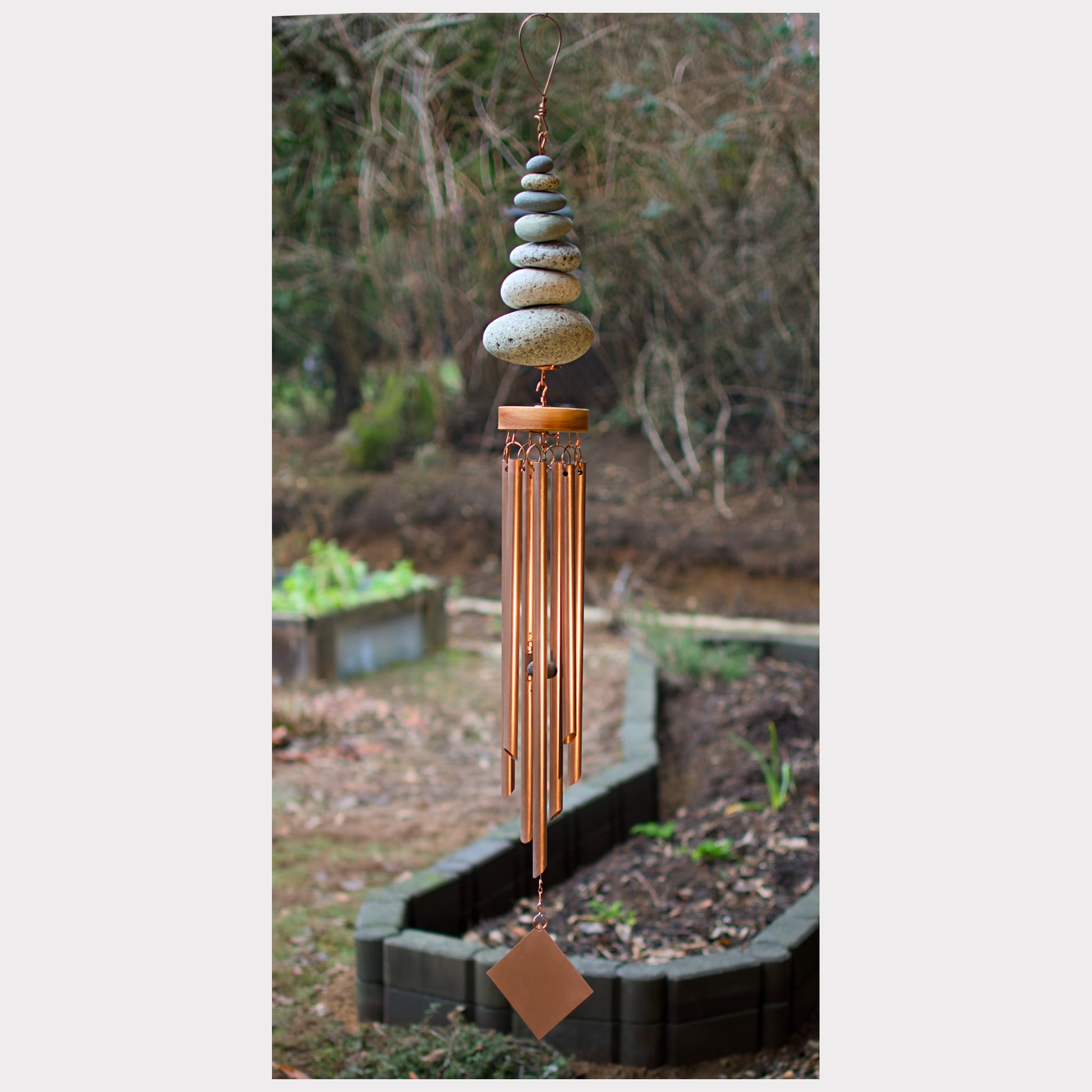 Zen wind chime with seven beach stones and seven copper chimes.