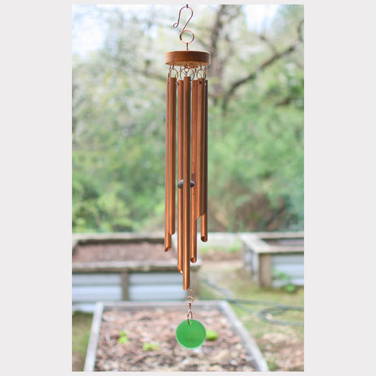 Wind chime featuring seven genuine copper chimes and a light green glass windsail.