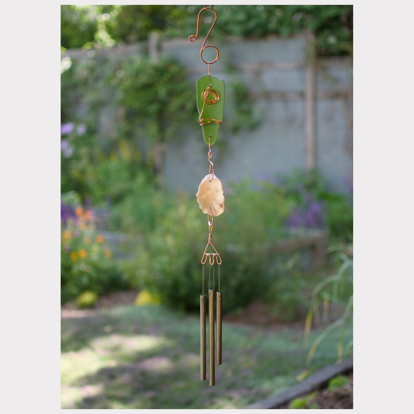 Small glass and oyster shell handcrafted wind chime.