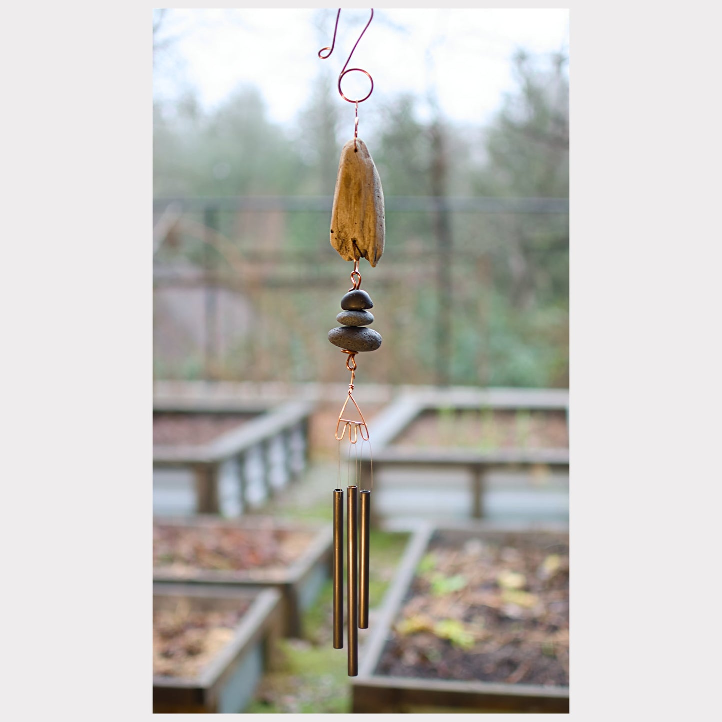 Zen driftwood and beach stones wind chime.