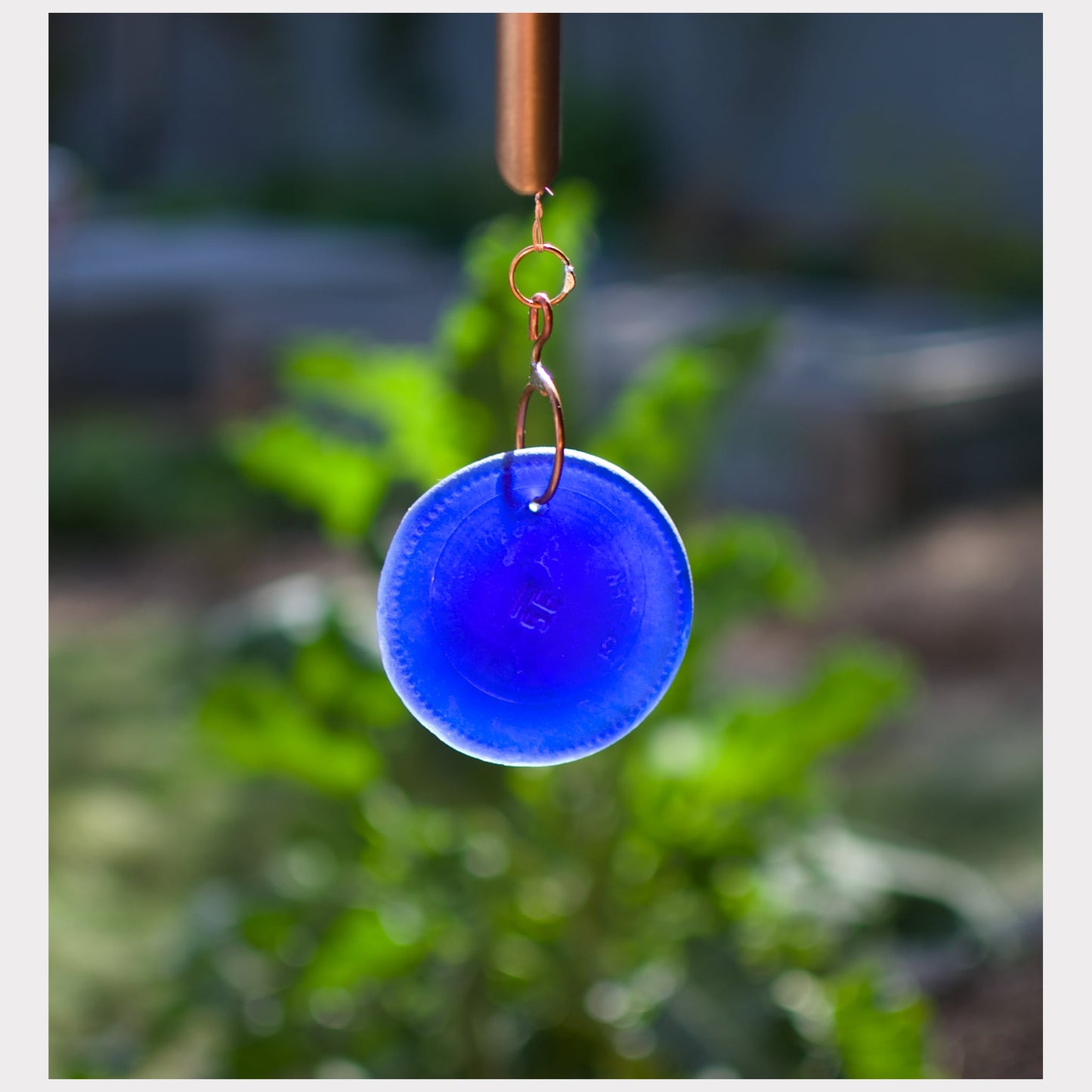 detail, artist-made sea glass cobalt blue windsail for a large wind chime